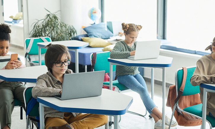 Students using devices in classroom