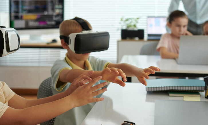 Kids using VR headsets