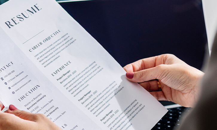 Person reviewing resume