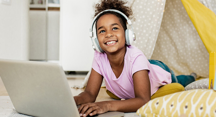 Kid uses computer at home for school
