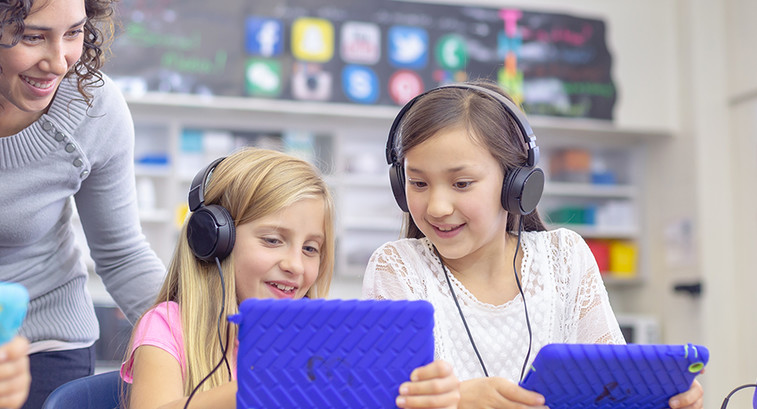 Elementary students using technology at school