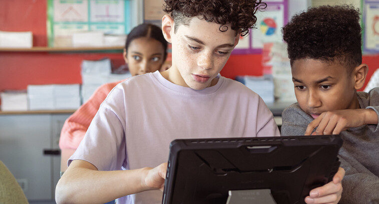 Kids working on group assignment during class