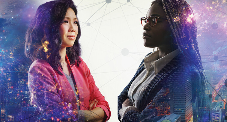 Image shows two women looking at each other with their arms crossed and a cityscape behind them
