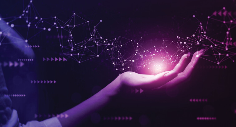Hand holding glowing network connection