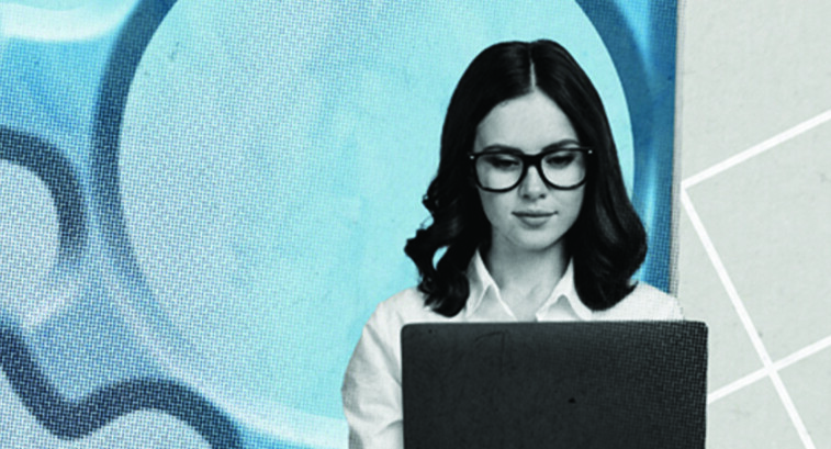 Person using laptop with gears in the background