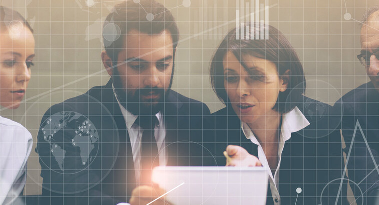 People at a laptop with grid