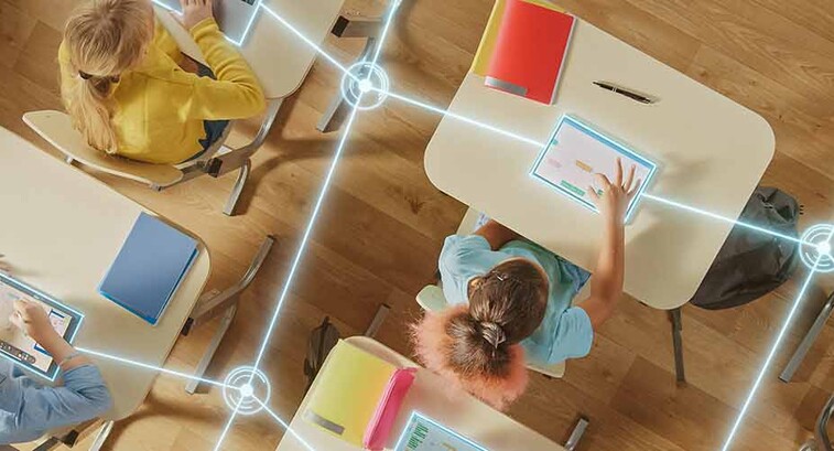 Students using tech in the classroom