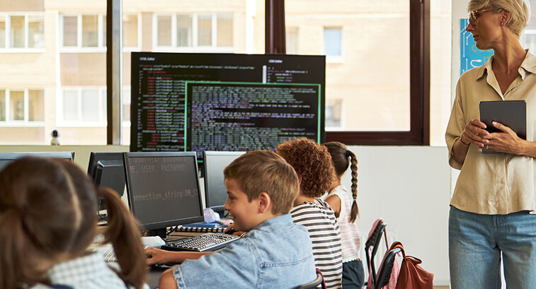 Teacher observing students in a classroom