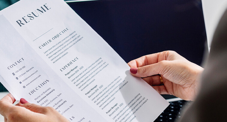 Person reviewing resume