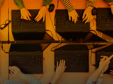 Students working on laptops - cybersecurity checklist