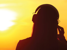 student using headphones silhouette