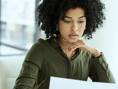 Businesswoman going over paperwork