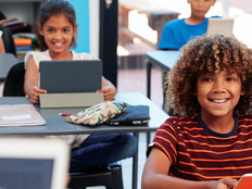 Students using tech in the classroom
