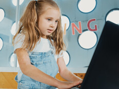 student securely using laptop for k-12 schoolwork 