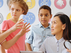 K-12 students learning STEM with teacher