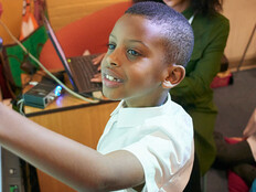 Student using interactive whiteboard