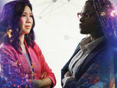 Image shows two women looking at each other with their arms crossed and a cityscape behind them