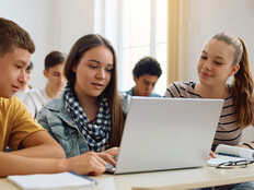 Students collaborating in class