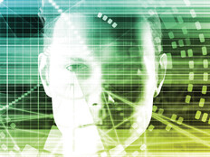 Portrait of person obscured by technology overlay to symbolize cybersecurity and physical security