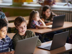 Students using computers in class