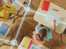 Students using tech in the classroom