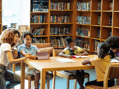 Students reading in library