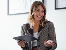 Professional holding a tablet