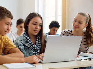 Students collaborating in class