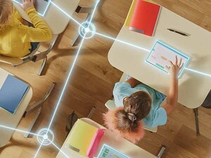 Students using tech in the classroom