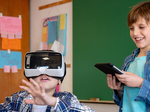 Students using VR and tech