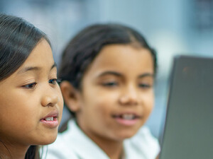 Students using a computer