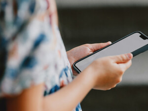 Young student using phone