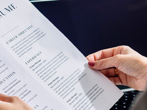 Person reviewing resume