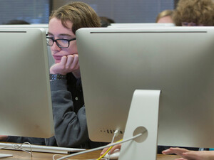 Students using computers in school