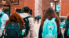 Students with backpacks
