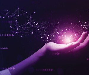 Hand holding glowing network connection