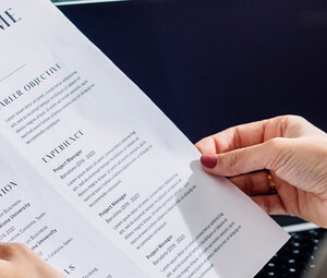 Person reviewing resume